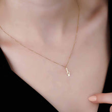 Load image into Gallery viewer, Small Treble Clef Musical Charm Necklace in Solid Gold
